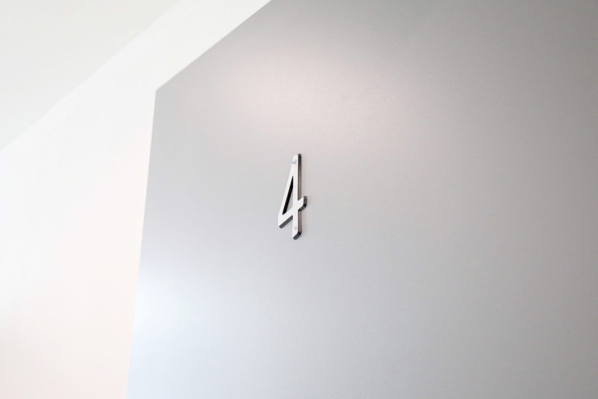 this image shows a number four with grey background