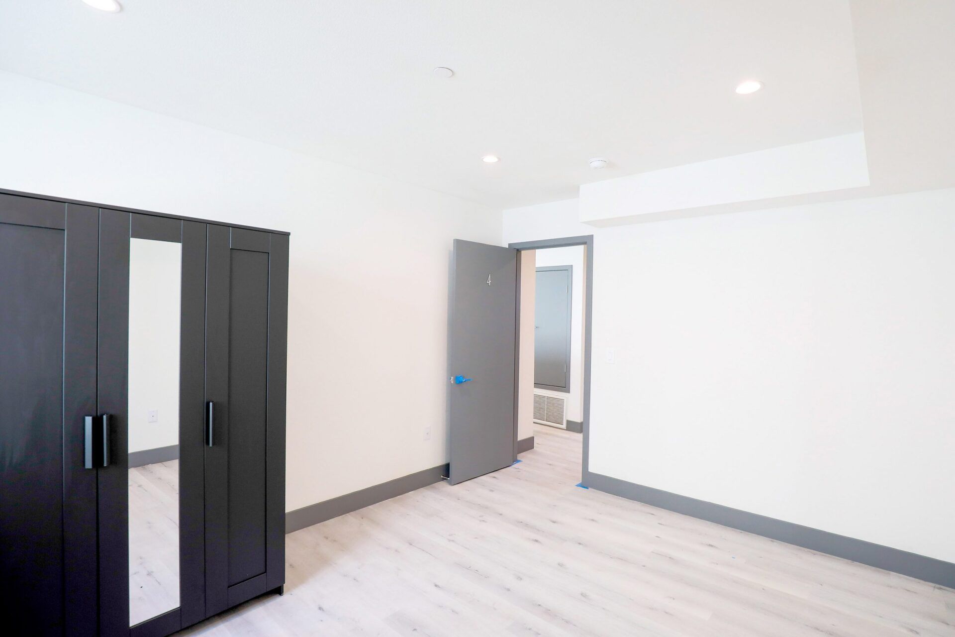 this image shows empty room with white and brown background