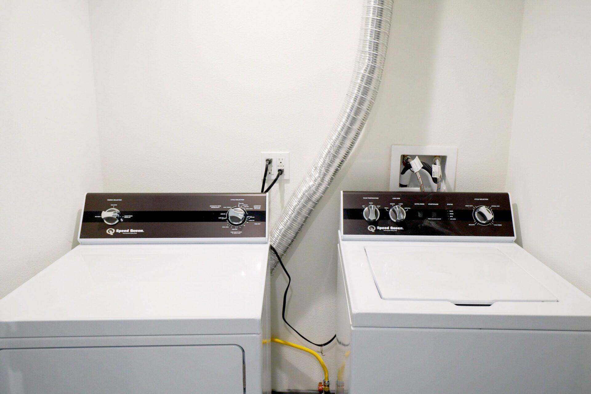this image shows two washing machines with white background