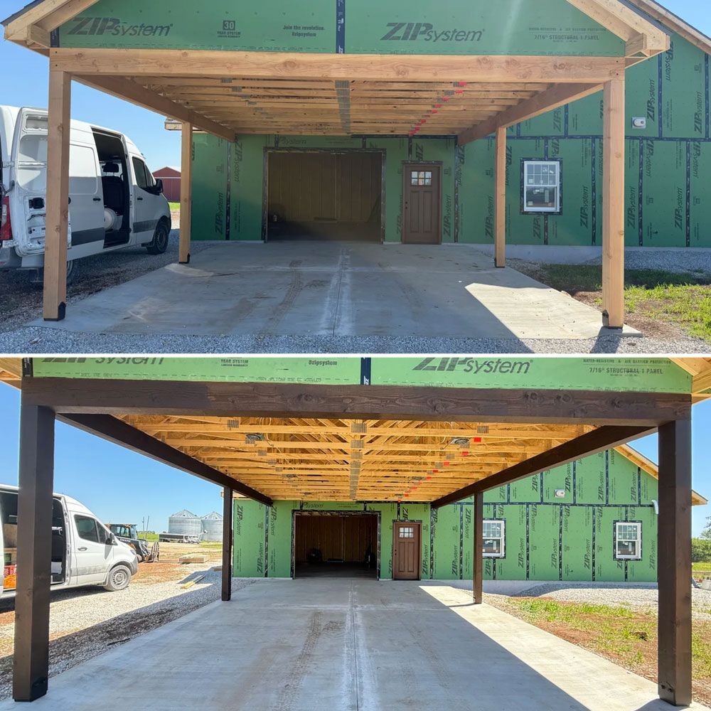 Unfinished house entry with covered porch, exposed wood framing, and green ZIP System sheathing in bright daylight