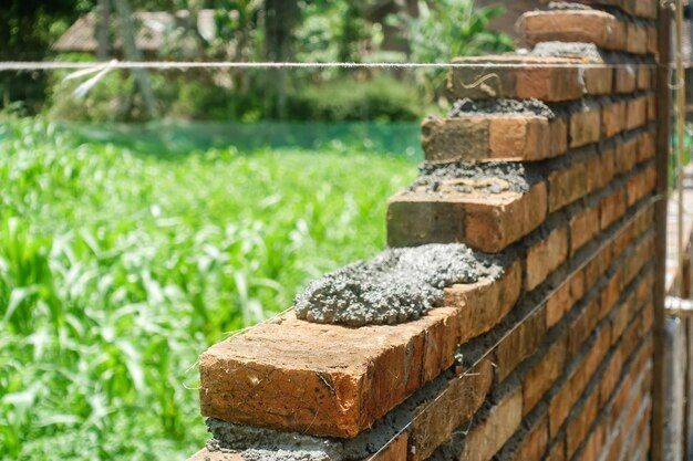building wall with cement red brick