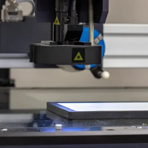 A close up of a machine with a triangle on it.