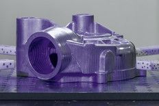 A purple object is sitting on top of a table.