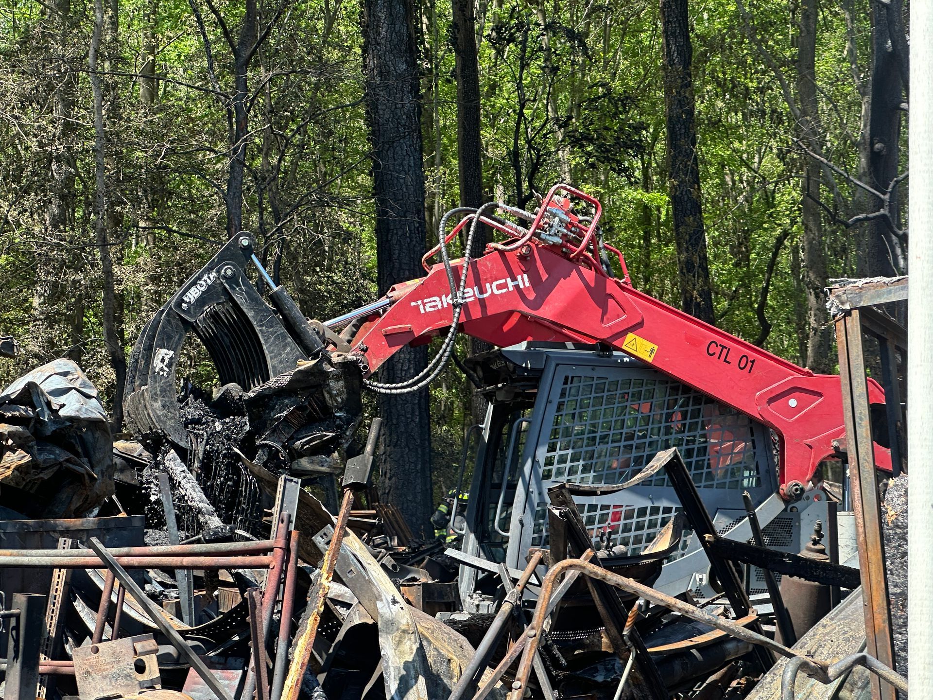 Heavy equipment land clearing removing large trees in Dover Delaware
