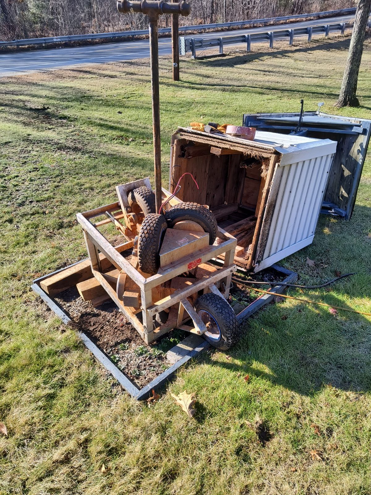 Wooden Cart on Top of a Grass Covered Field — Uxbridge, MA — Darling's Water Well Company