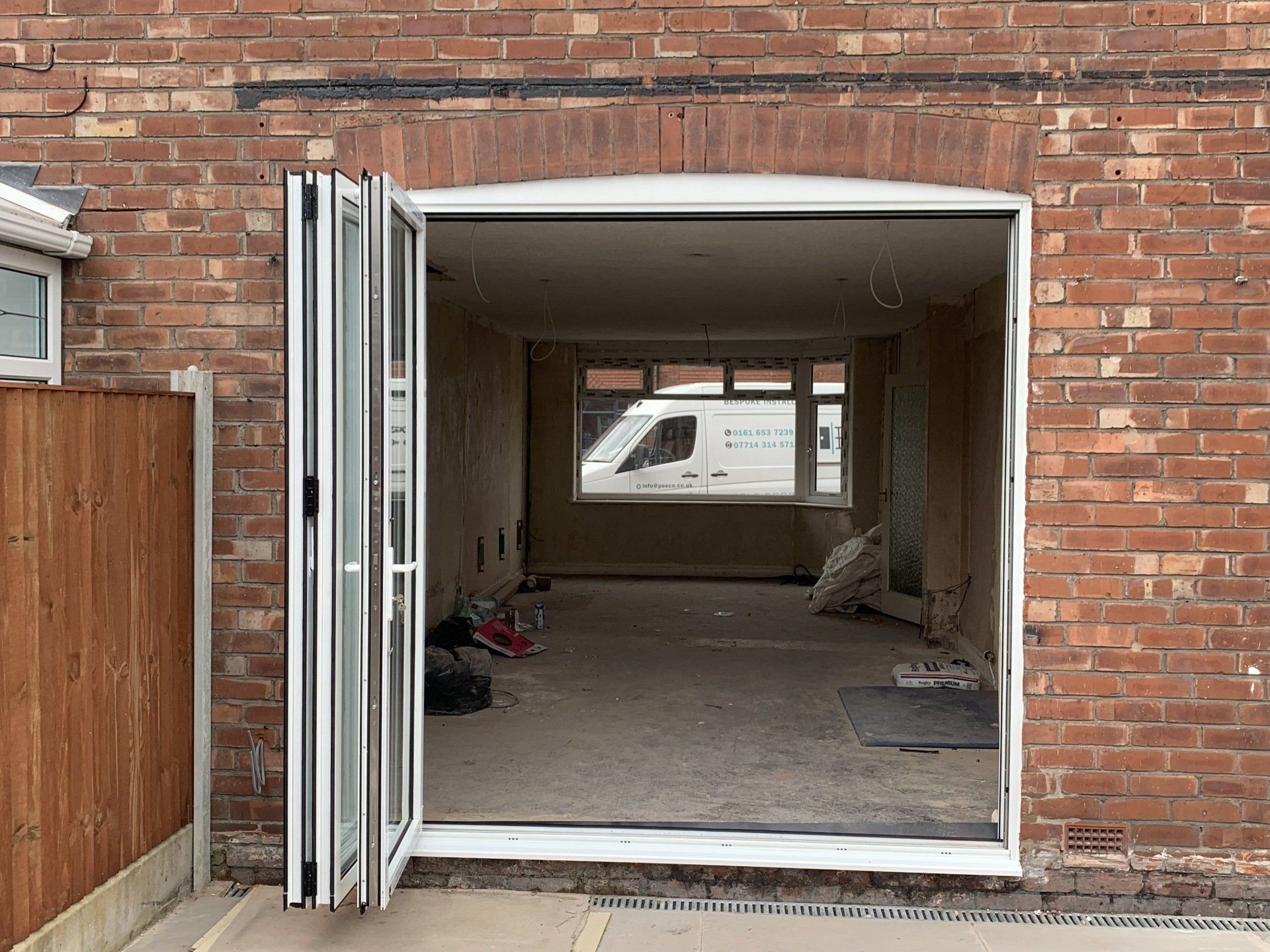 white aluminium bifold doors installed