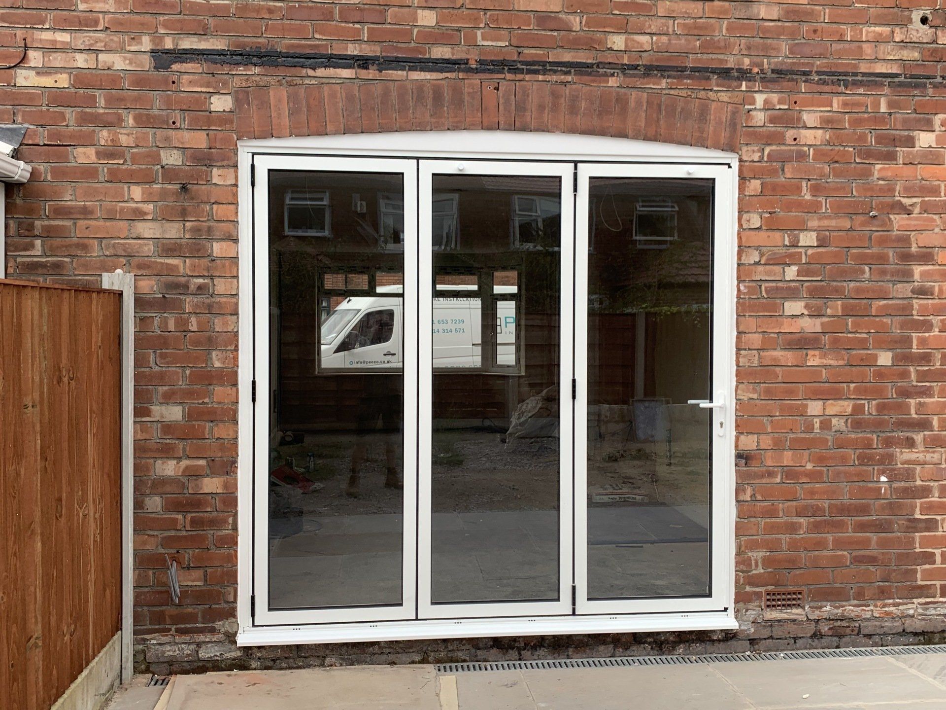 white aluminium bifold doors installed