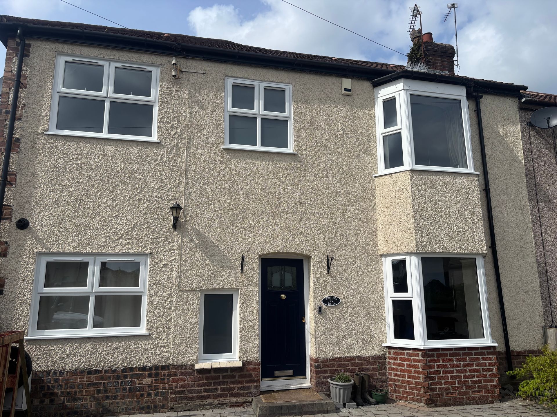 White A-rated uPVC double glazed windows installed on a house in Middleton Manchester