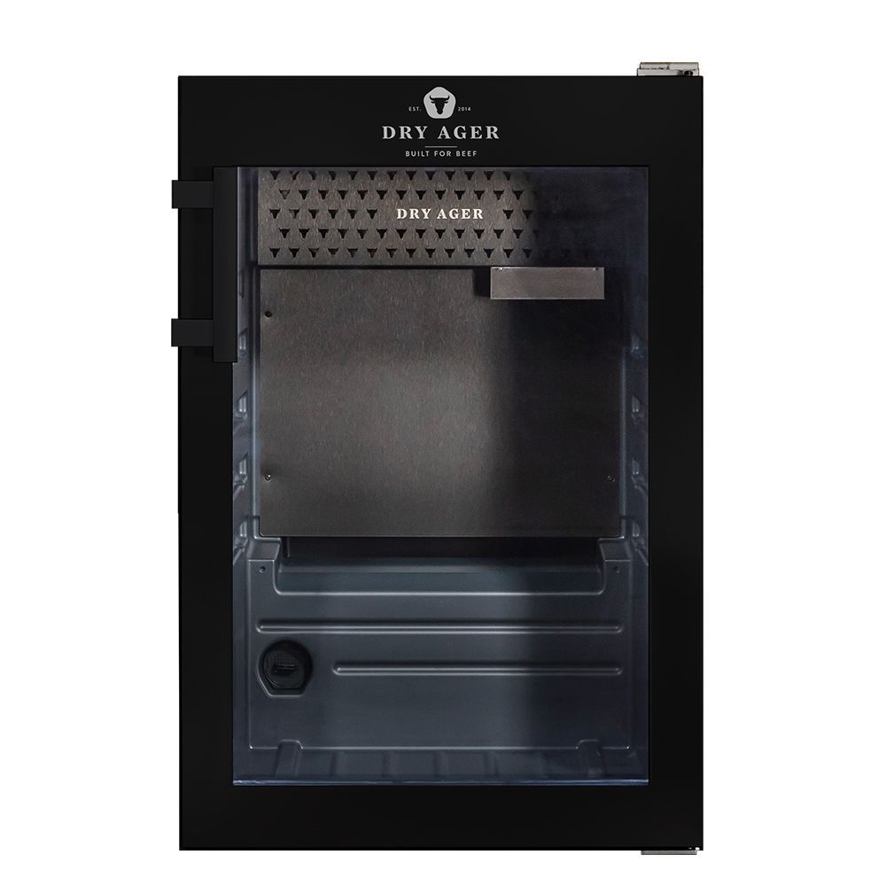 Frigorífico para maduración de carnes Dry Ager de acero inoxidable con puerta de cristal abierta, interior visible.