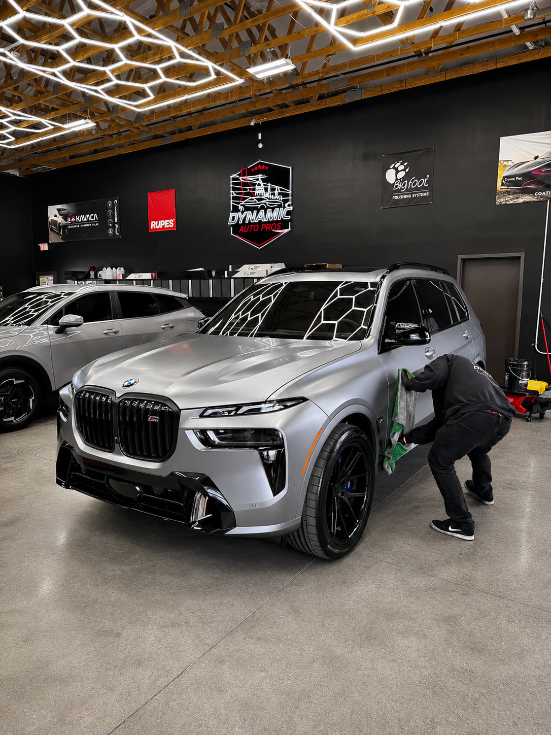 Matte PPF Luxury Vehicle being cleaned by a Dynamic Auto Pros Technician