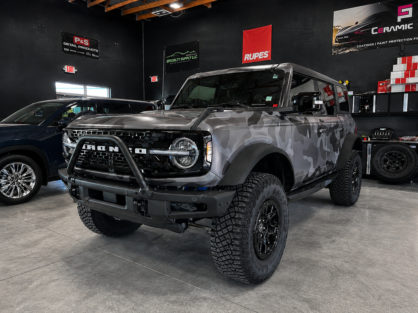 A originally blue Ford Bronco was wrapped in Camo