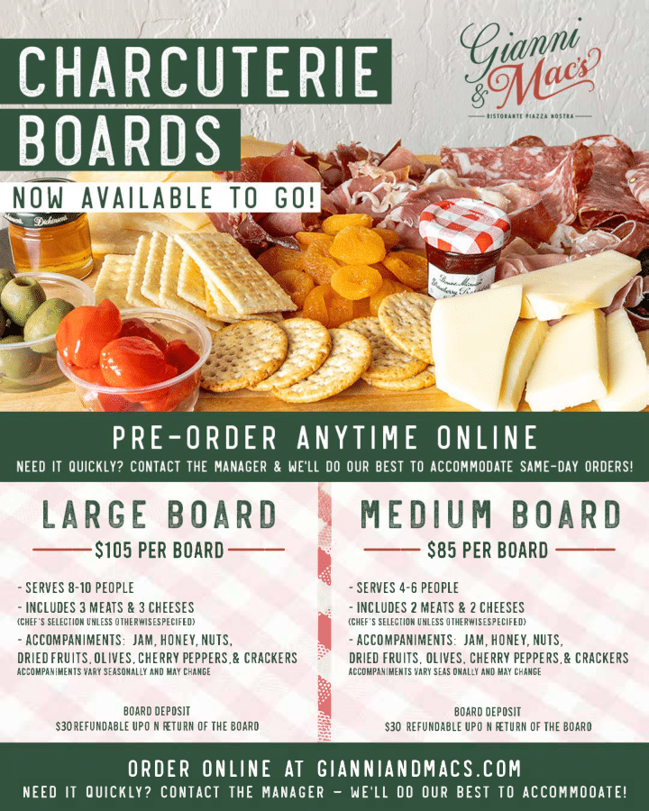 Charcuterie boards preorder ad with assorted meats, cheeses, crackers, olives, and tomatoes on a table
