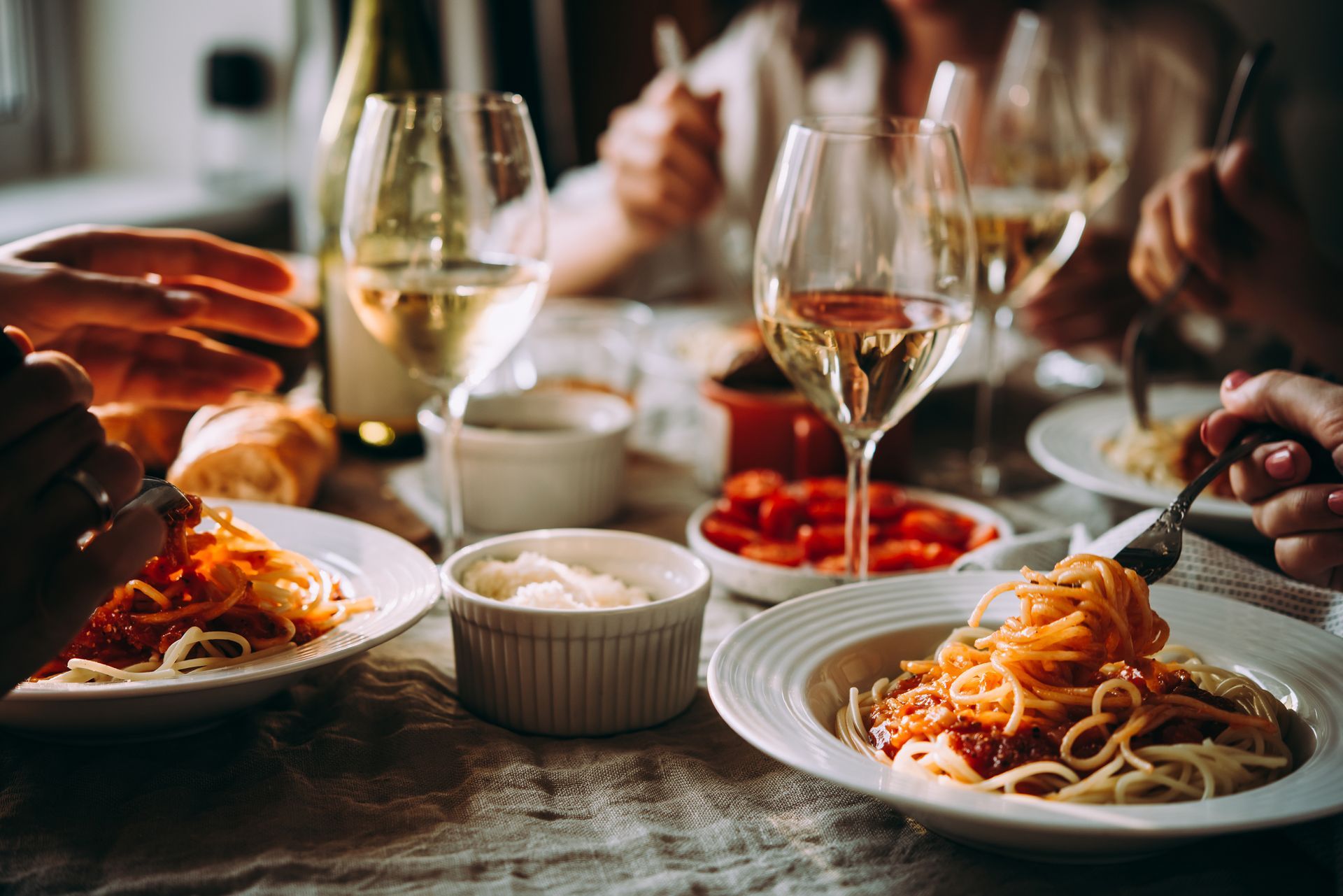 Wine glasses and pasta dinner Wine glasses and pasta dinner