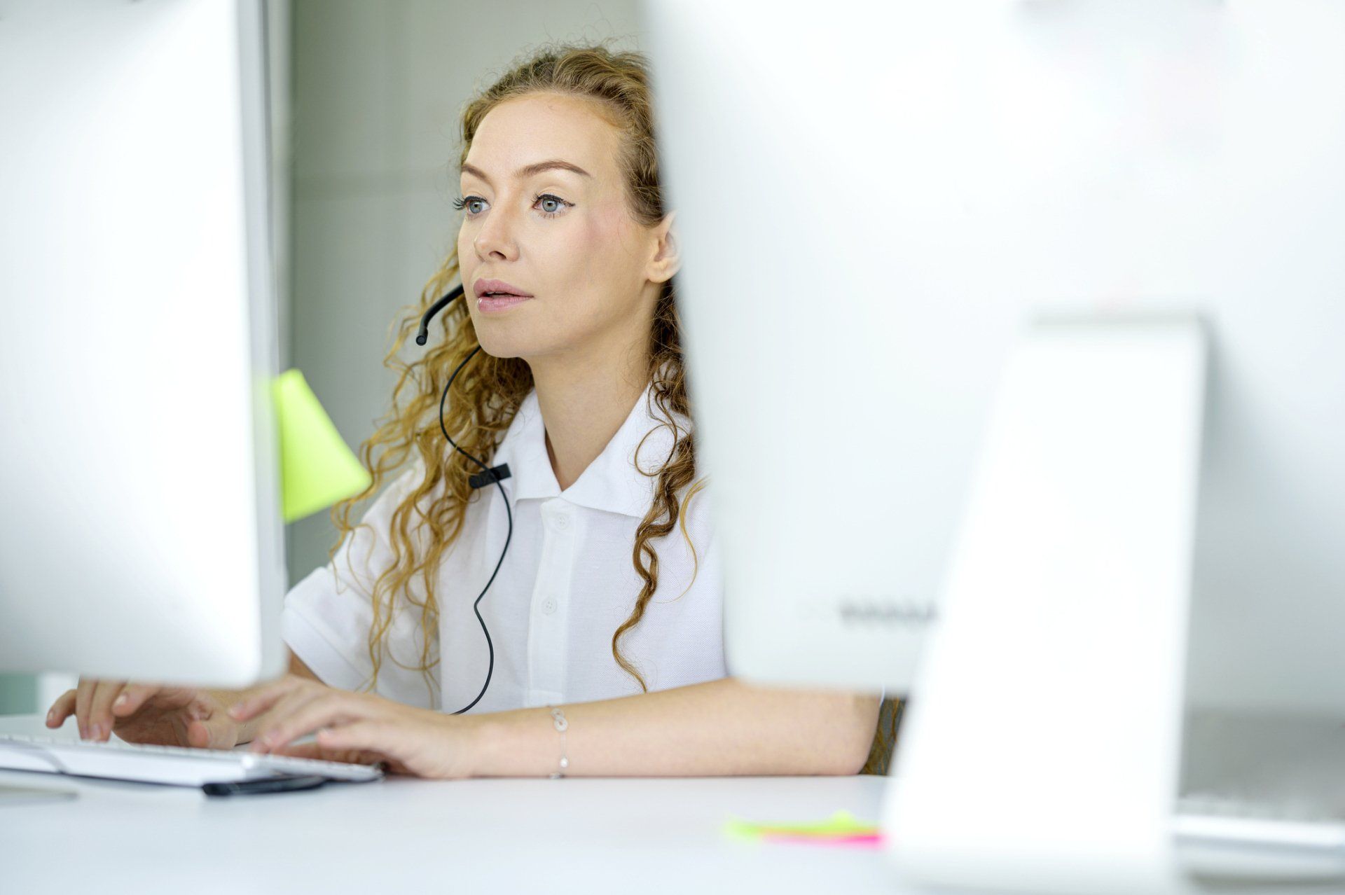 Employee on Computer - PYA Insurance Brokerage in Ontario, CA Employee on Computer - PYA Insurance Brokerage in Ontario, CA