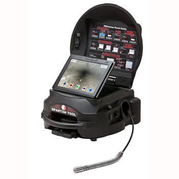 A black camera with a screen and a microphone attached to it.
