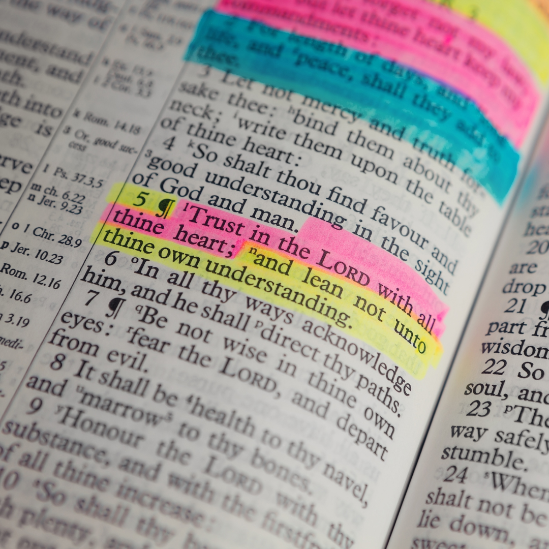 A bible is open to a page that says 