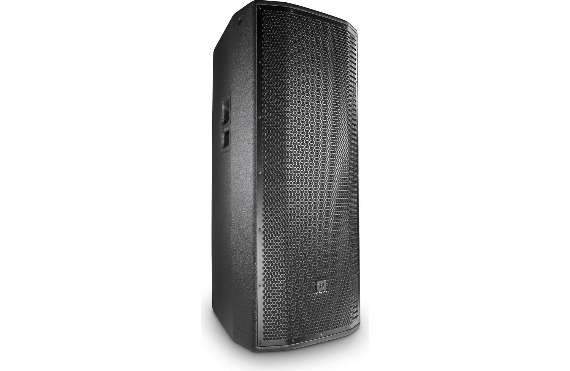 A black speaker is sitting on a white surface.