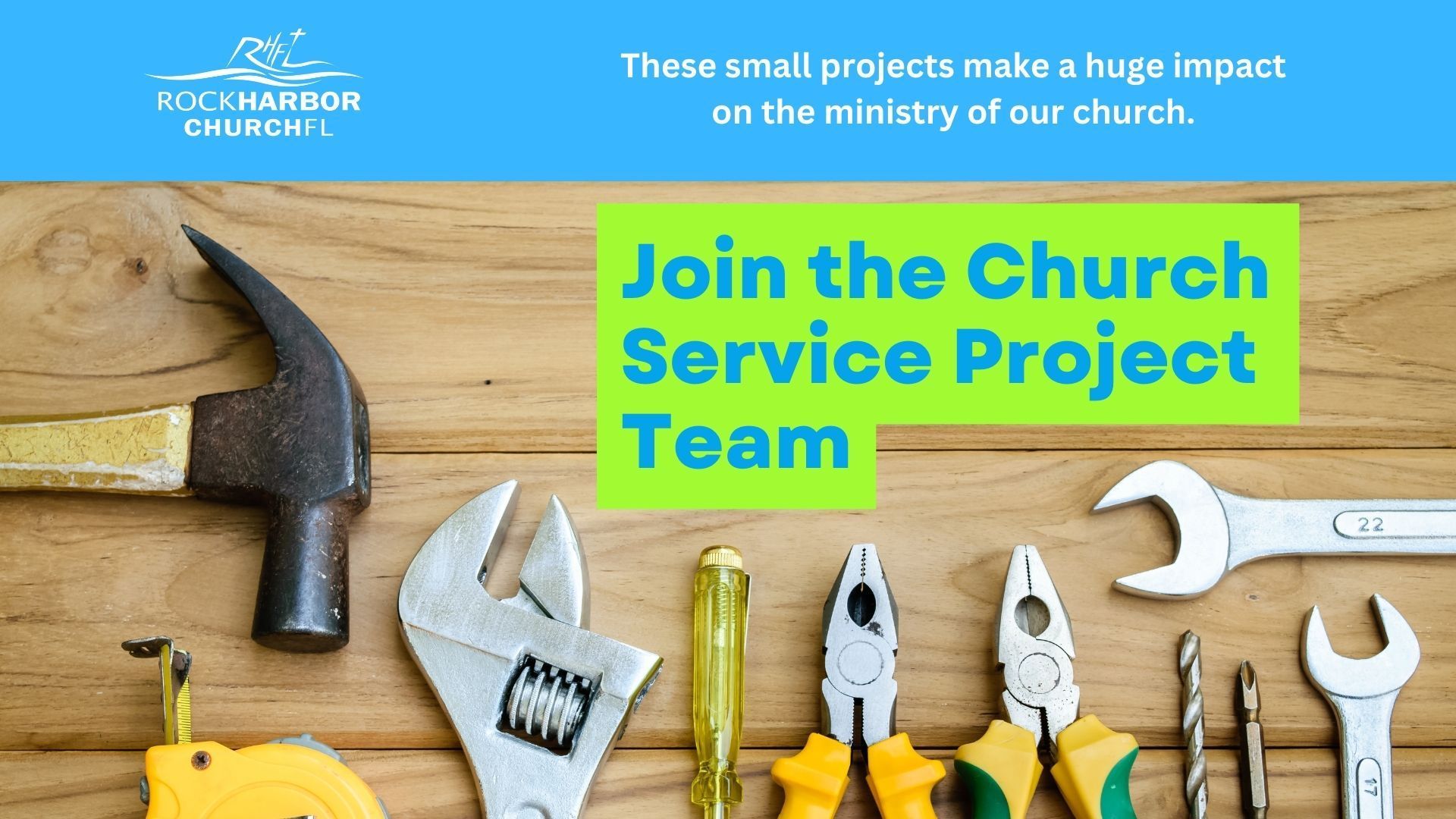 A wooden table topped with tools and the words `` join the church service project team ''.