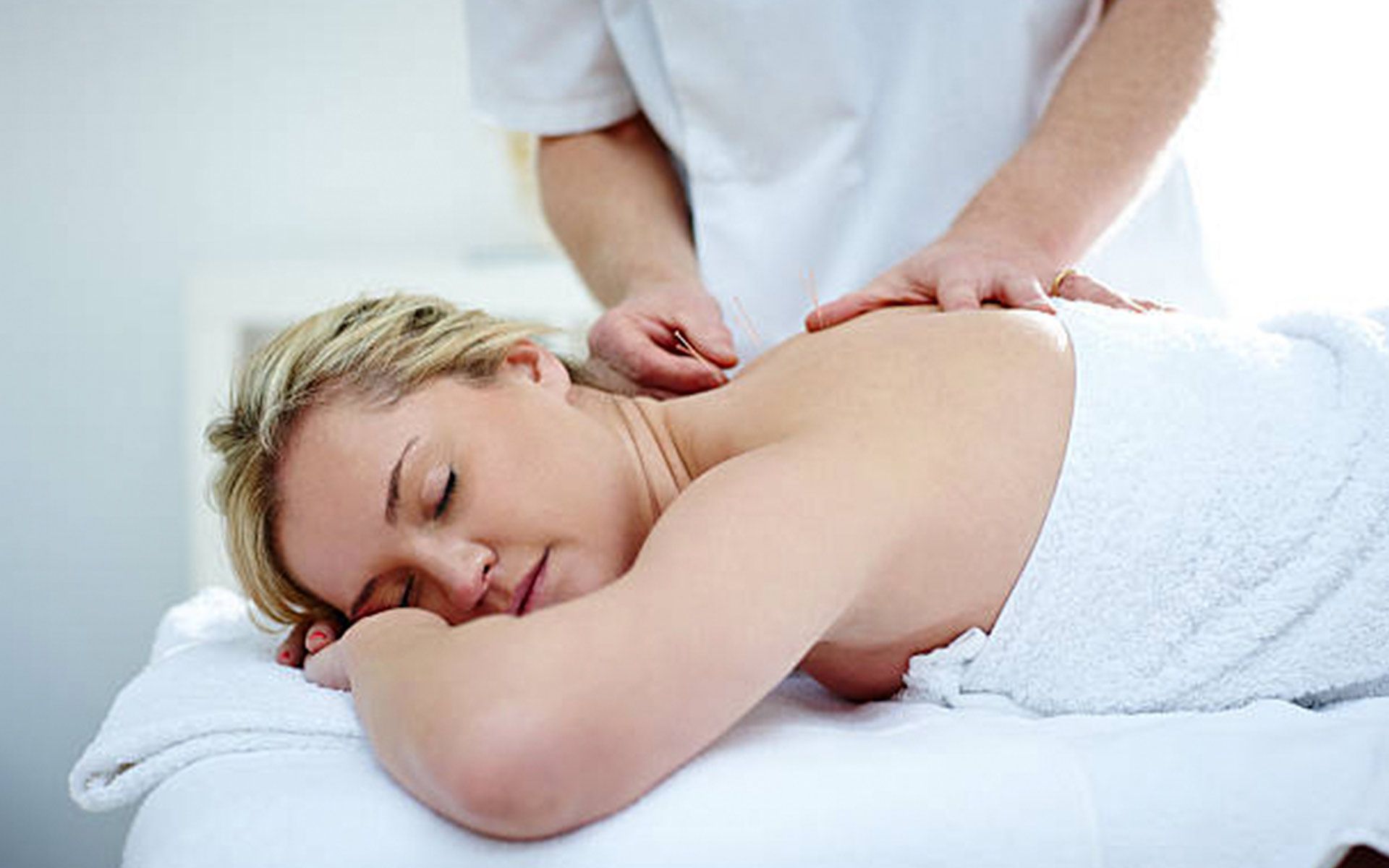Woman Receiving An Acupuncture — Lafayette, LA — Shift Acupuncture And Wellness