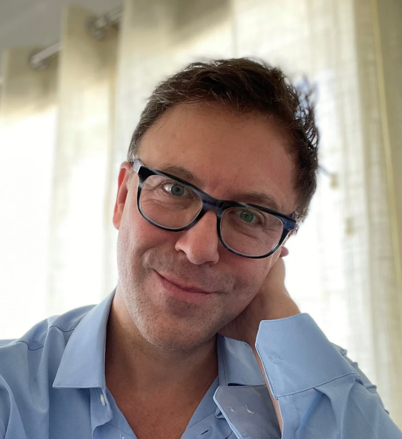 A headshot of Michael Conley, music director