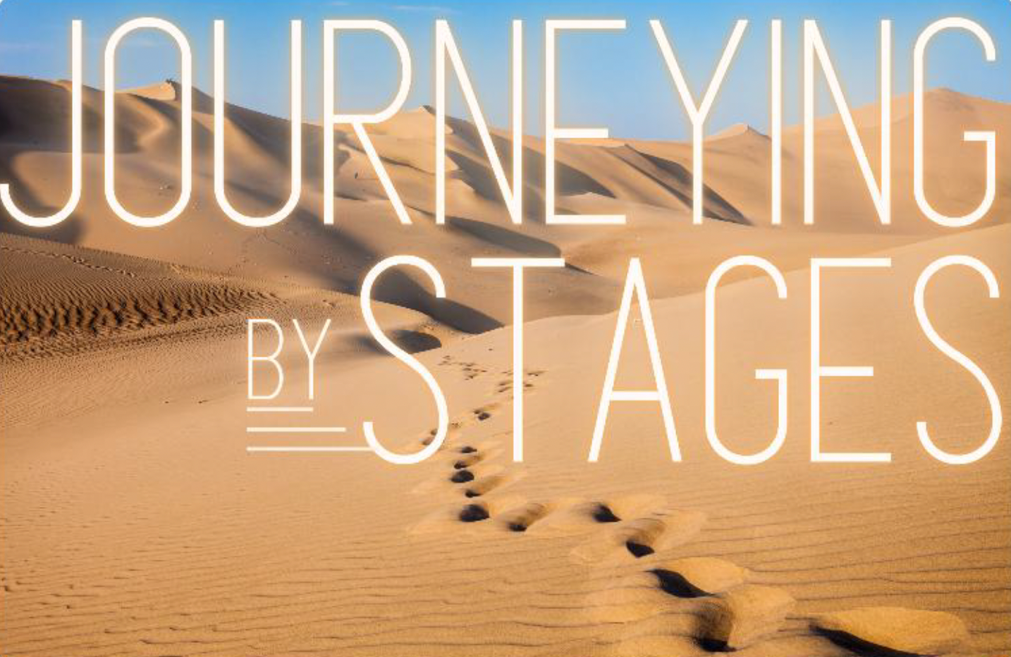A desert with footsteps in the sand