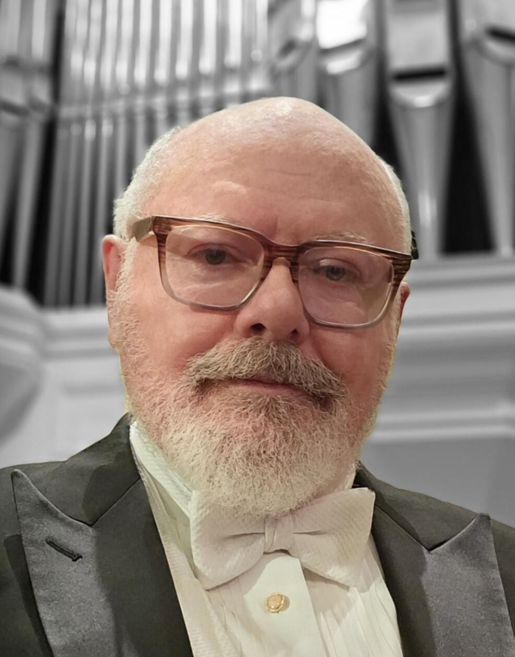 A headshot of John Walko, organist