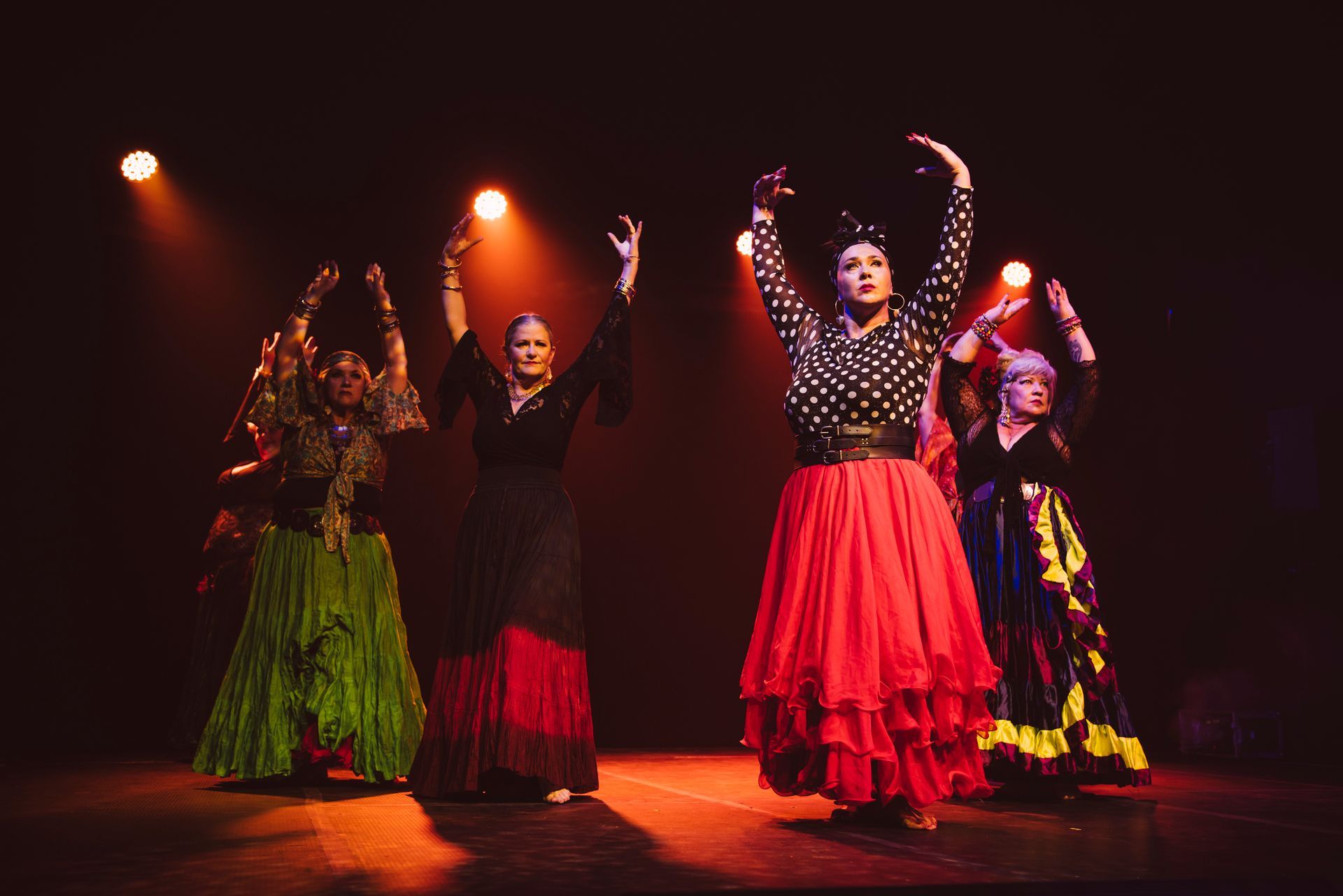 A group of women are dancing flamenco on a stage — Global Dance Collective In West End, QLD