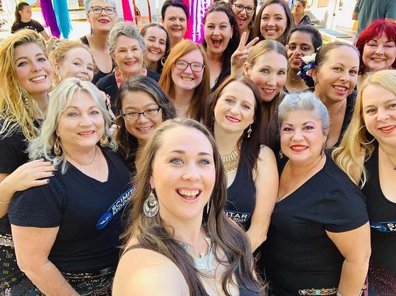 A Group Of Women Are Posing For A Picture Together And Smiling — Global Dance Collective In West End, QLD