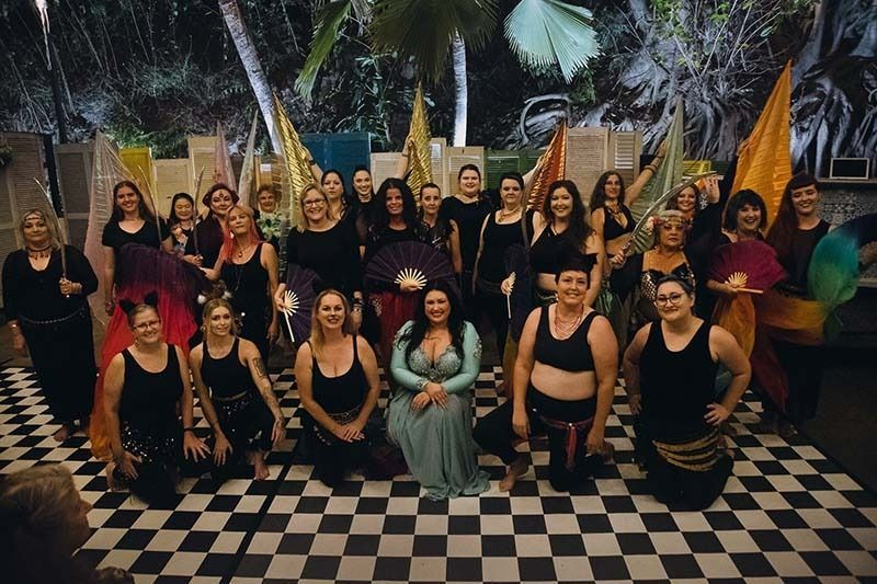 A Group Of Women Are Posing For A Picture On A Checkered Floor — Global Dance Collective In West End, QLD