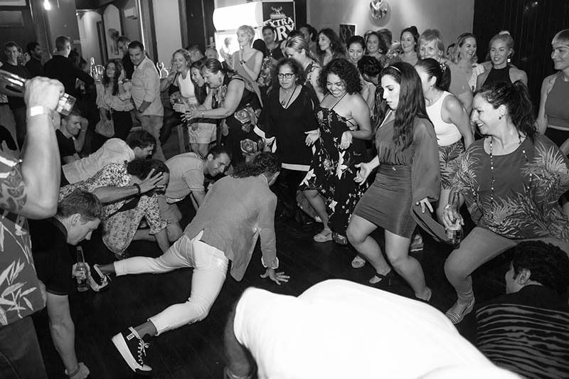 A Black And White Photo Of A Crowd Of People Dancing — Global Dance Collective In West End, QLD