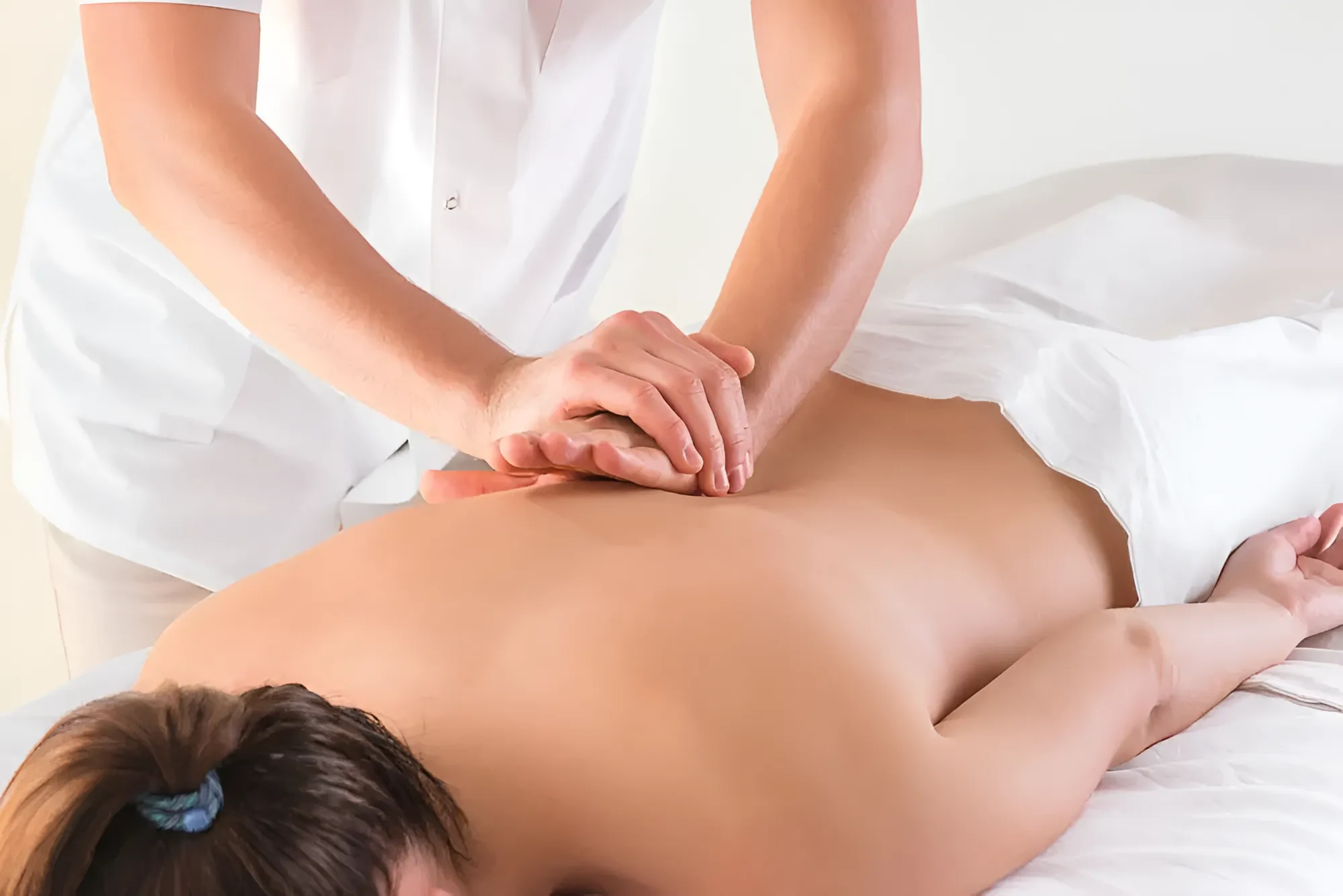 Person Receiving Back Massage in Spa — Barolin Physiotherapy Services in Bundaberg South, QLD