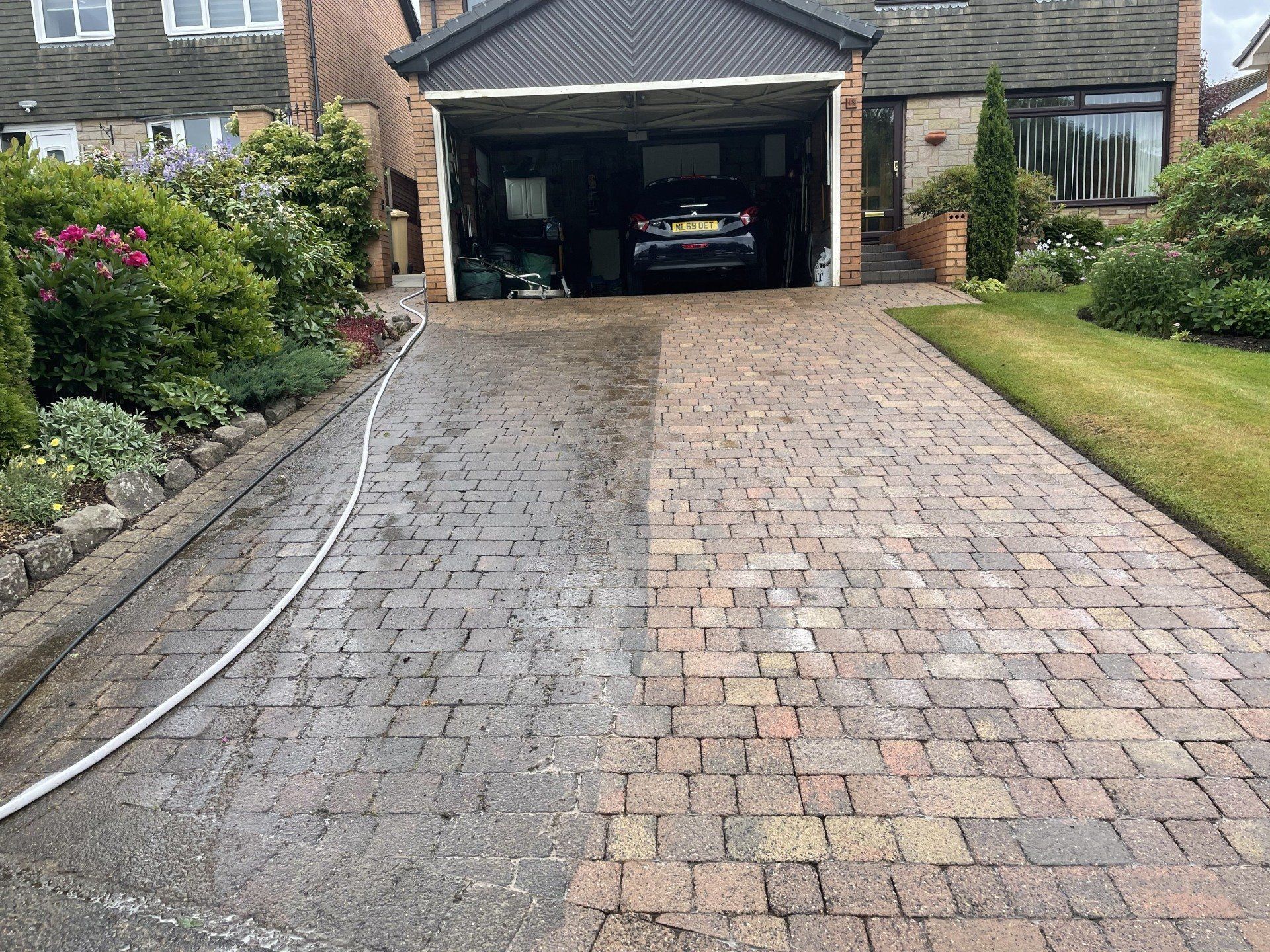 Coloured patio slabs uncleaned