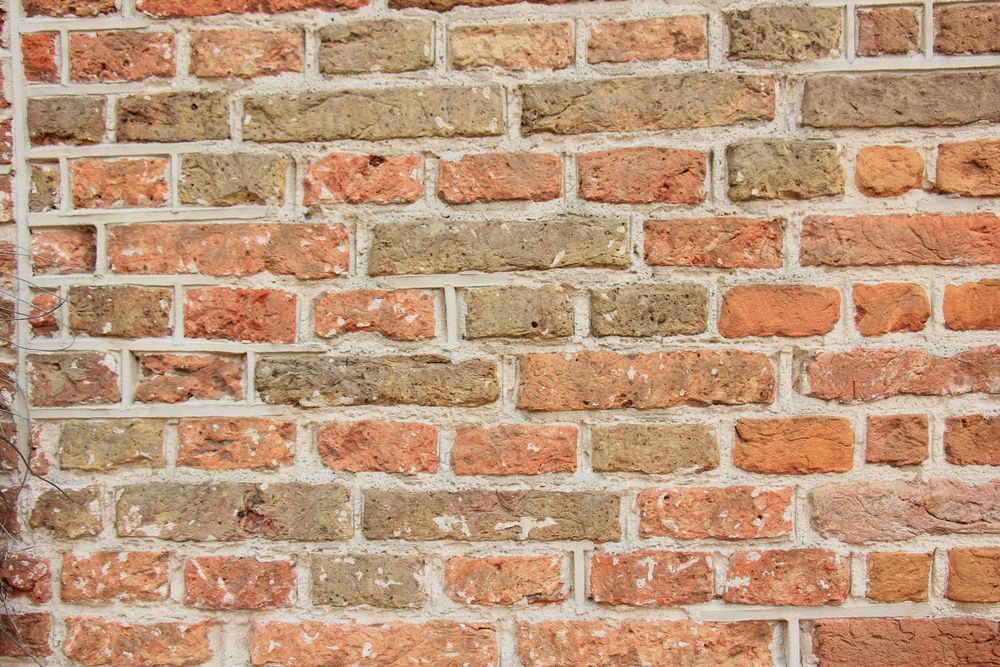 A Close Up Of A Brick Wall With A Lot Of Brick — Heritage Bricklaying & Remedial Services In Jilliby, NSW