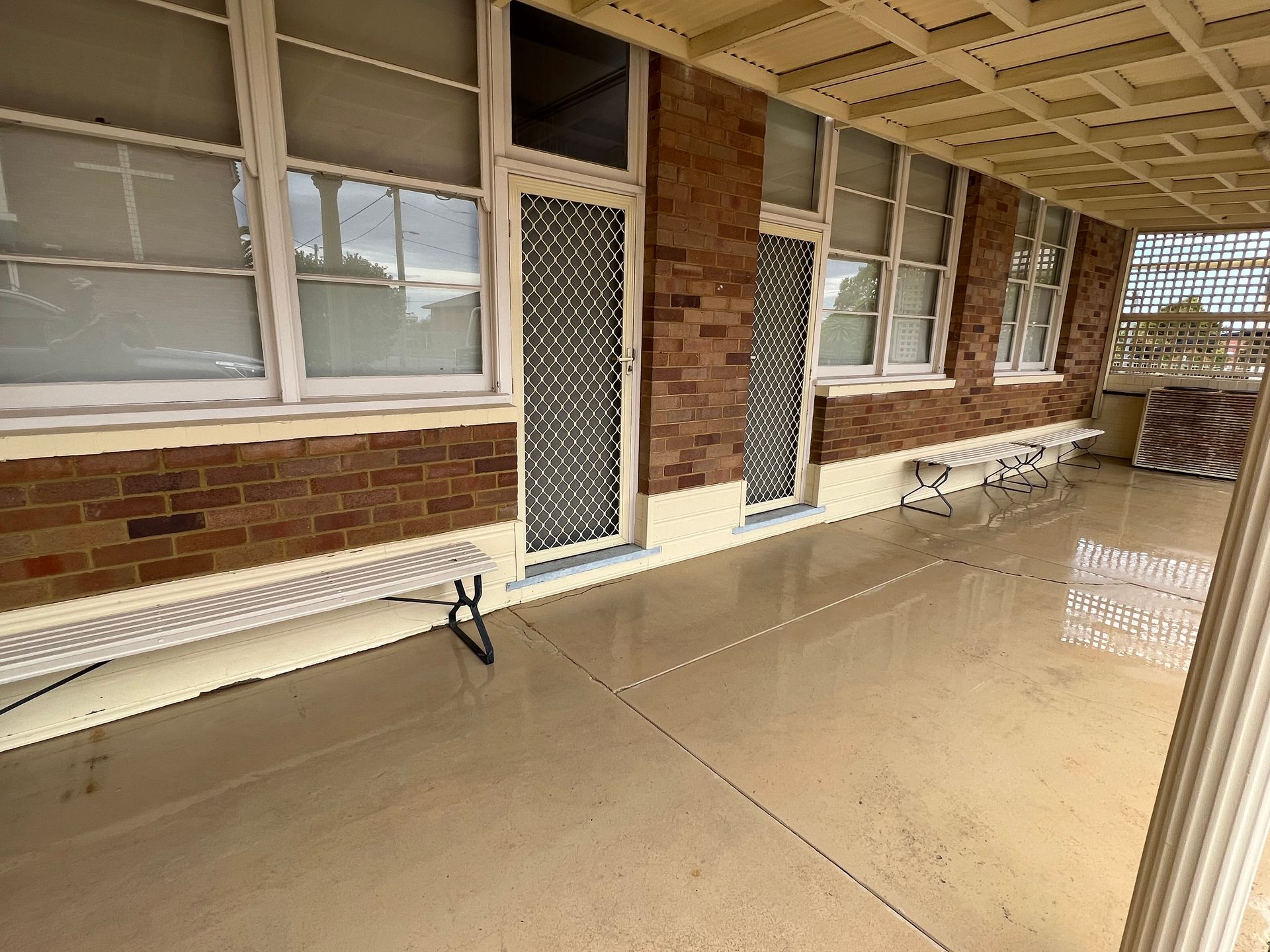 A Brick House And A Covered Verandah — Heritage Bricklaying & Remedial Services In Jilliby, NSW