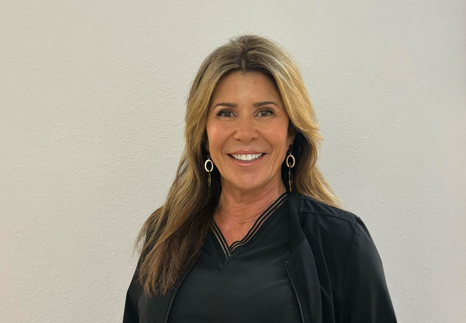 Kelly smiling for camera | family friendly dental staff in Friendswood TX