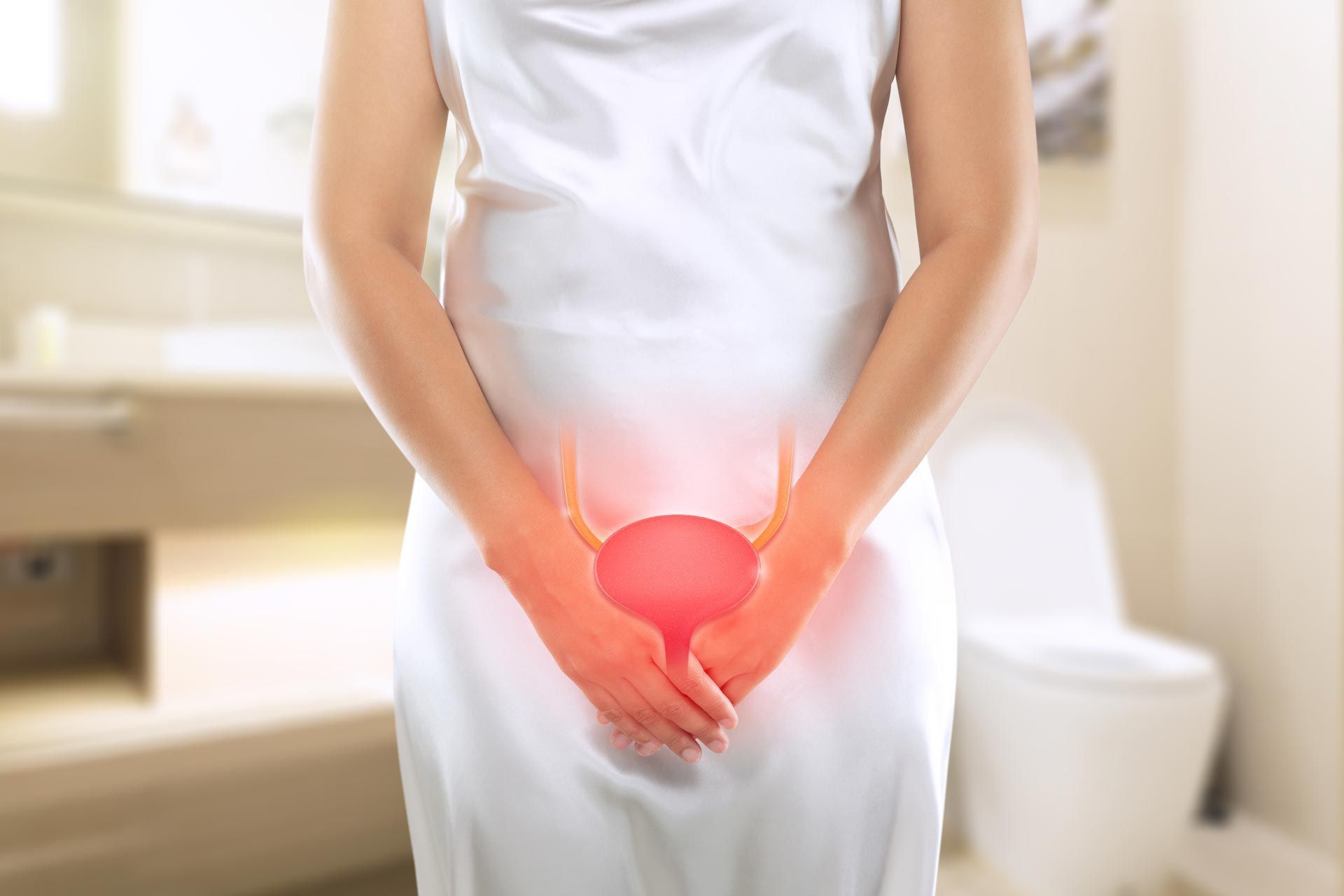 Person in white dress holding lower abdomen with red glow, suggesting pelvic pain in a bathroom.