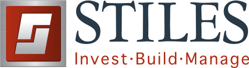 STILES logo with red square icon and gray text, plus tagline “Invest-Build-Manage” in red.