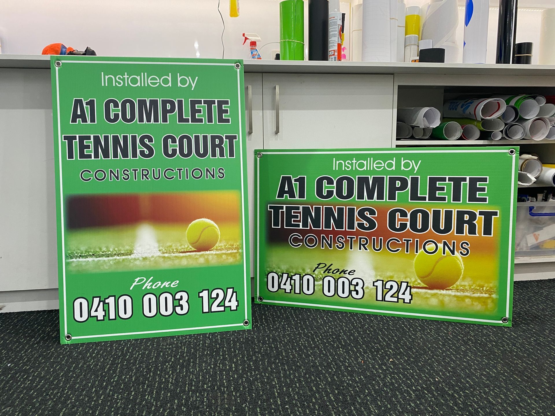 Tennis signs placed on carpet— Capital Signs in Fyshwick, ACT