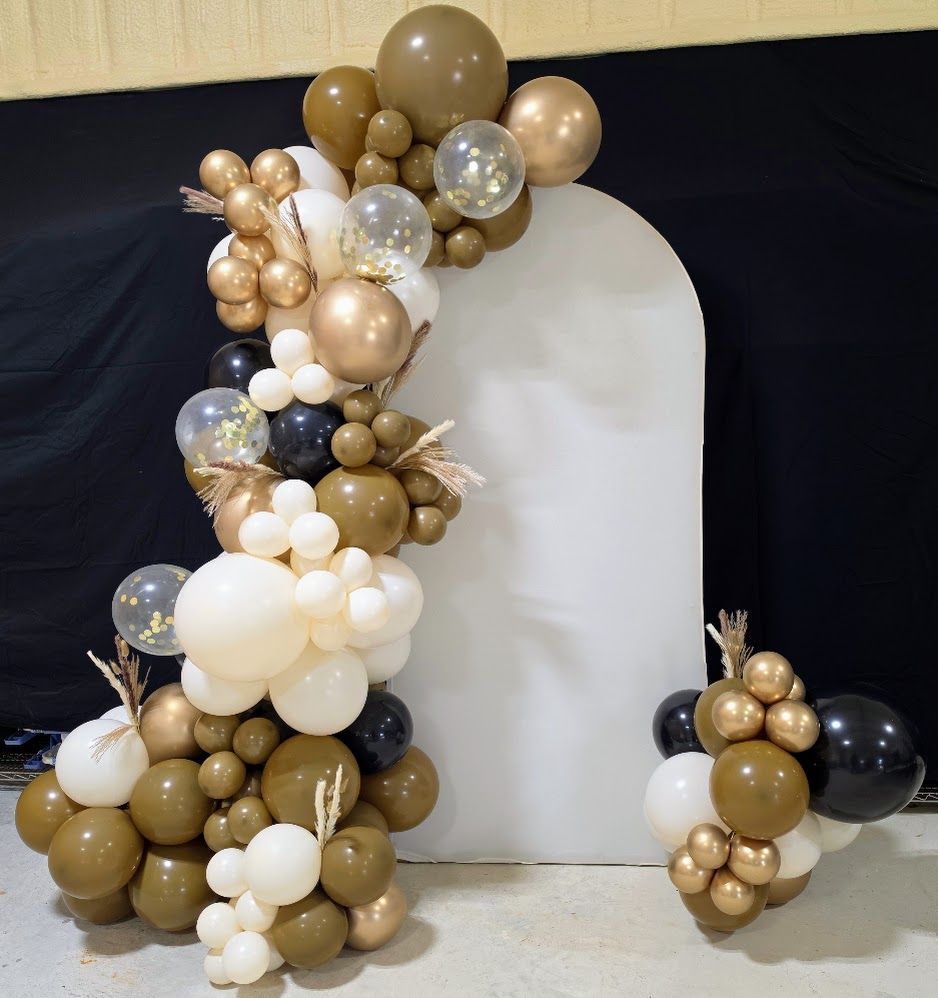Luxe organic balloon garland in latte cream and gold with pampas grass on white backdrop arch rental in San Antonio and Wilson County TX