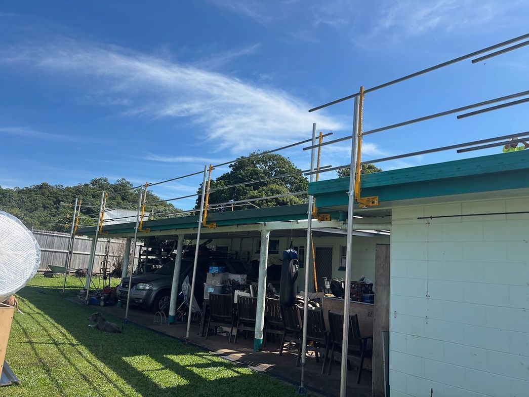 White Building With Green Roof — Underdog Edge Protection in Mareeba, QLD
