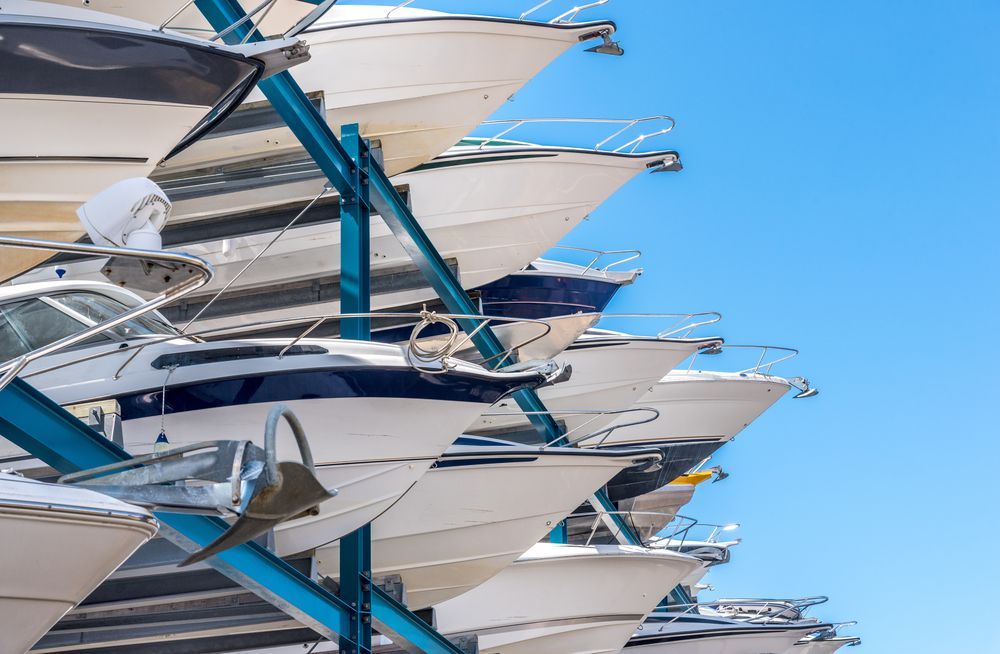Boats Stacked on Racks at a Marina, Blue Sky Background — Underdog Edge Protection in Redlynch, QLD