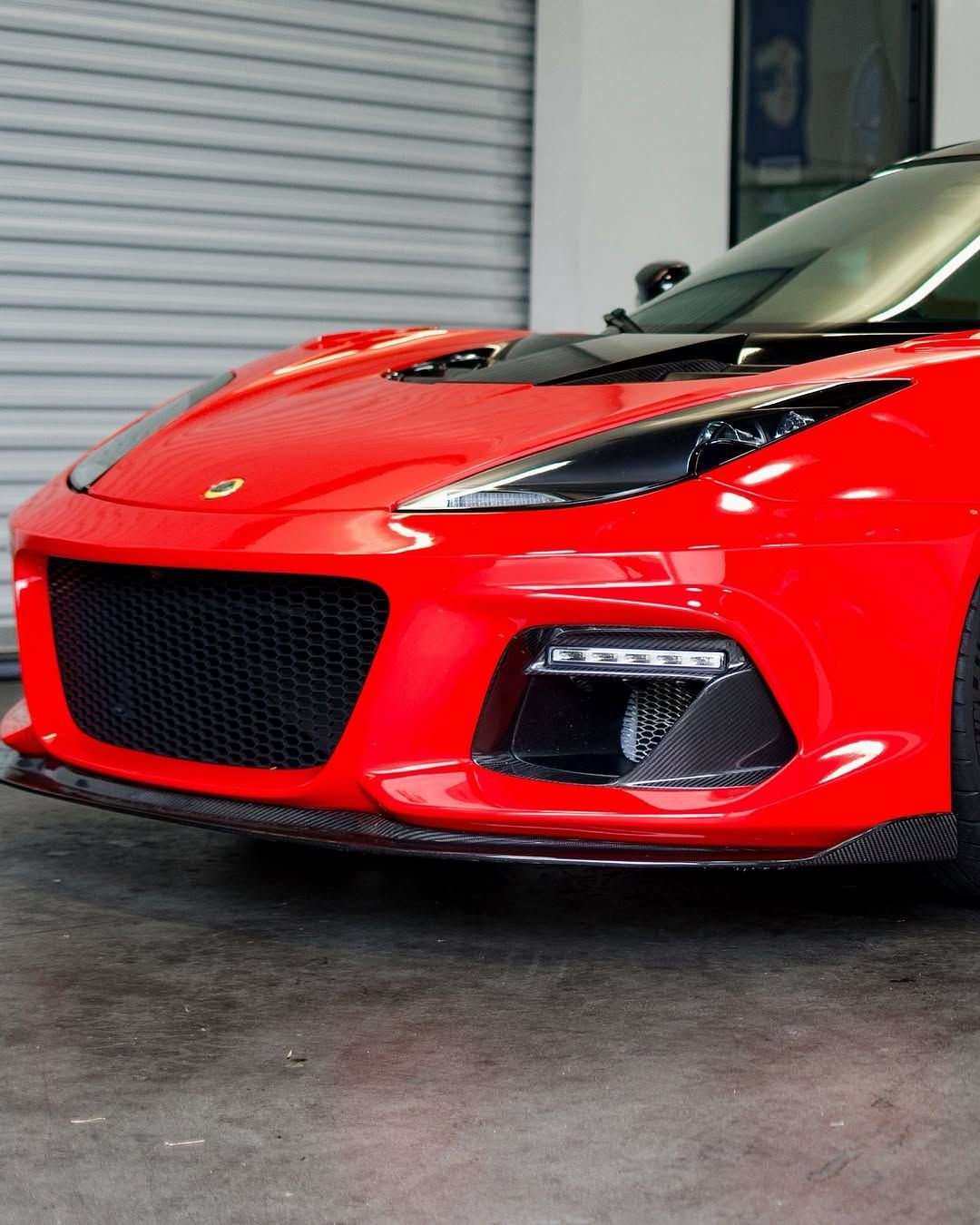 red car with PPF and ceramic coating 