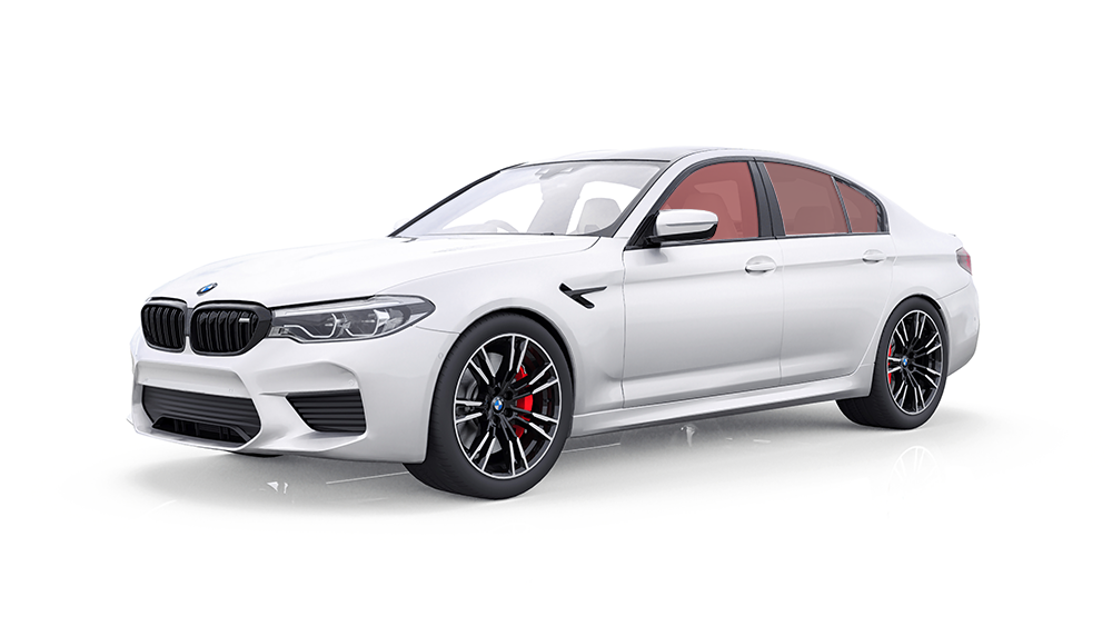 White BMW M5 sedan with black rims, red brake calipers, and red interior.