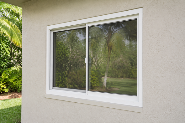A close up of a window with a screen on it.