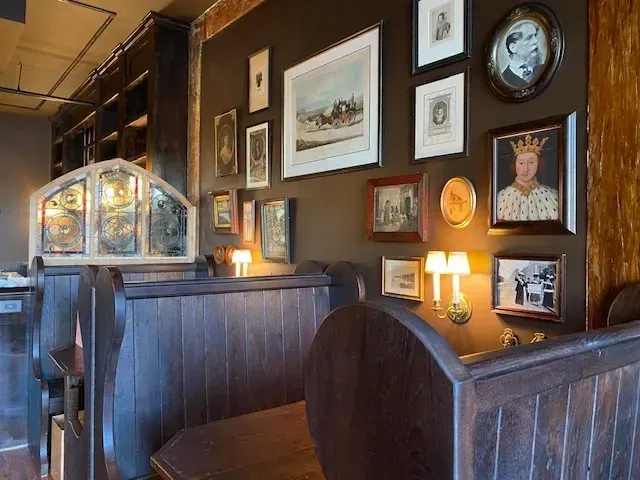 a restaurant with art on the wall