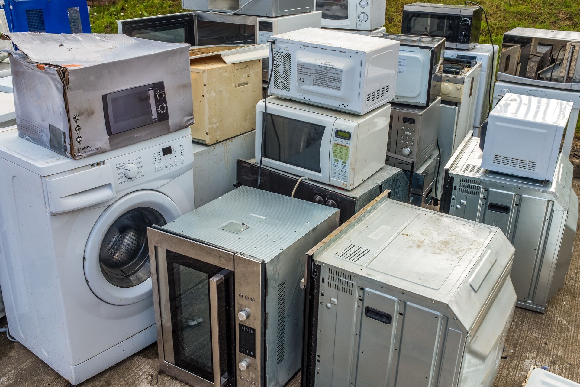 Old household appliances dropped off at a recycling center