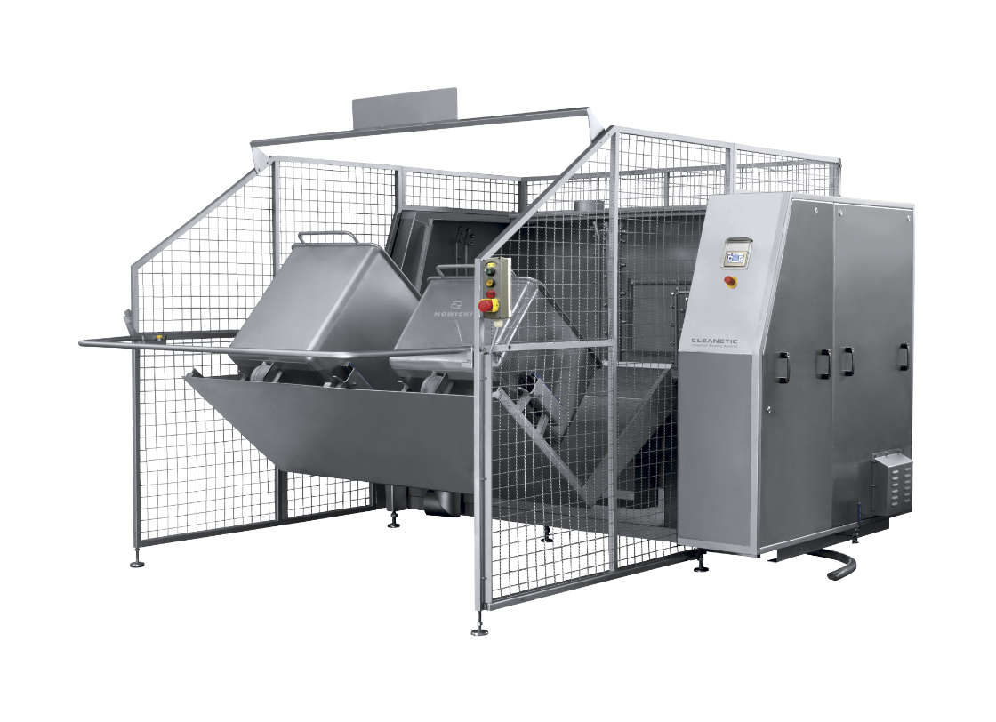 A stainless steel machine is sitting inside of a cage on a white background.