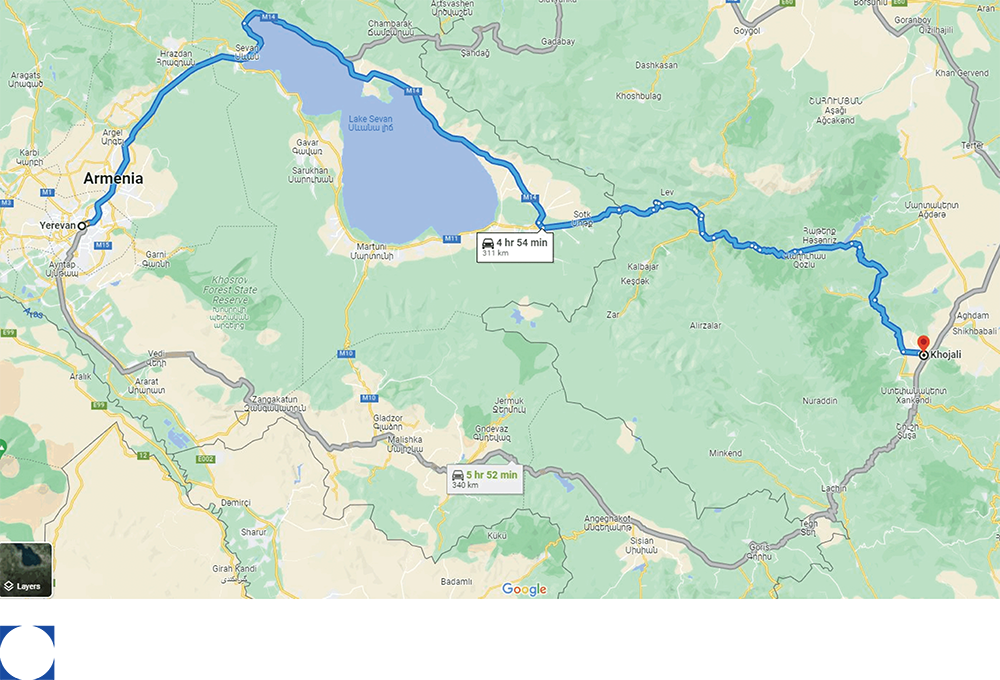 Map with a blue route circling a large blue lake and through mountainous terrain.
