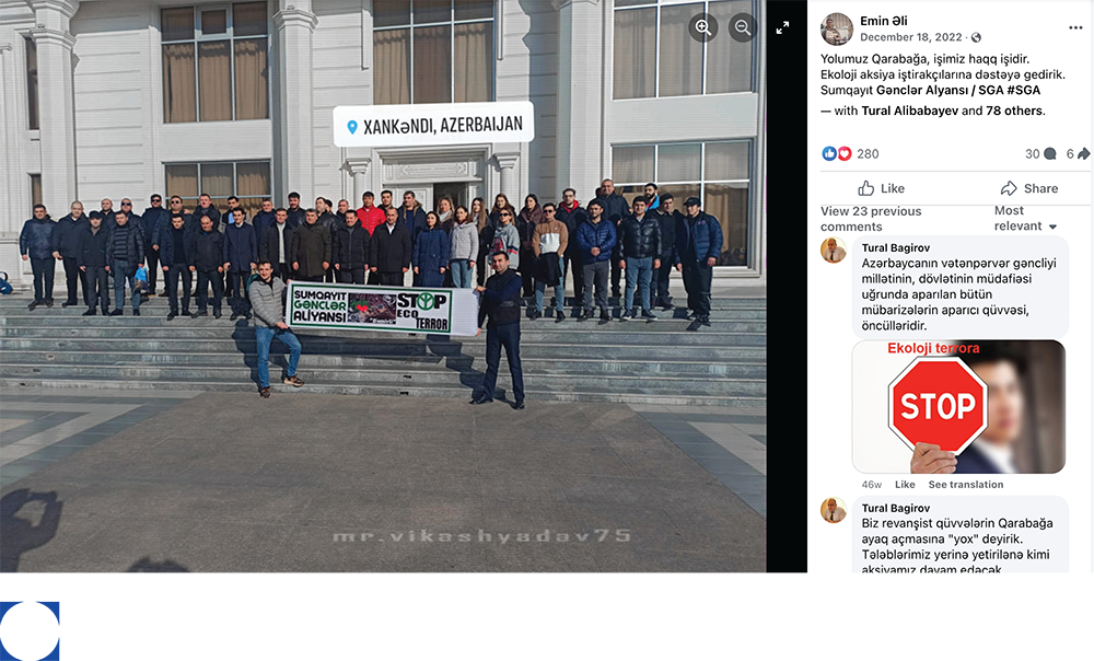 Facebook post showing people standing in front of a building, shown in a ZPO report.