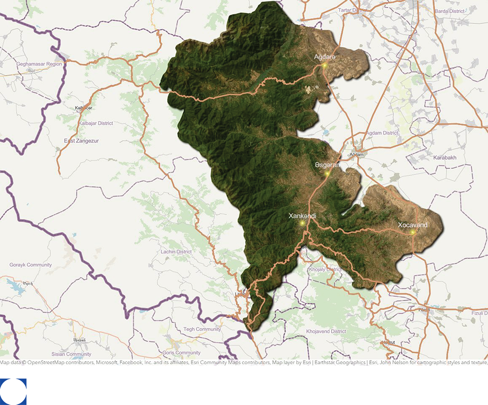Map of a mountainous region with towns and roads. The mountains are dense with greenery.